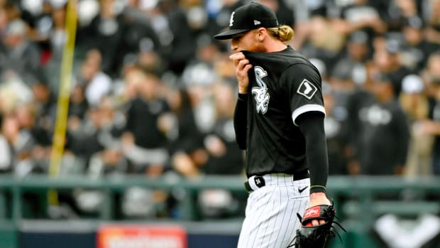 Oct 12, 2021; Chicago, Illinois, USA; Chicago White Sox starting pitcher Michael Kopech (34) reacts after a play against the Houston Astros during the fourth inning in game four of the 2021 ALDS at Guaranteed Rate Field.